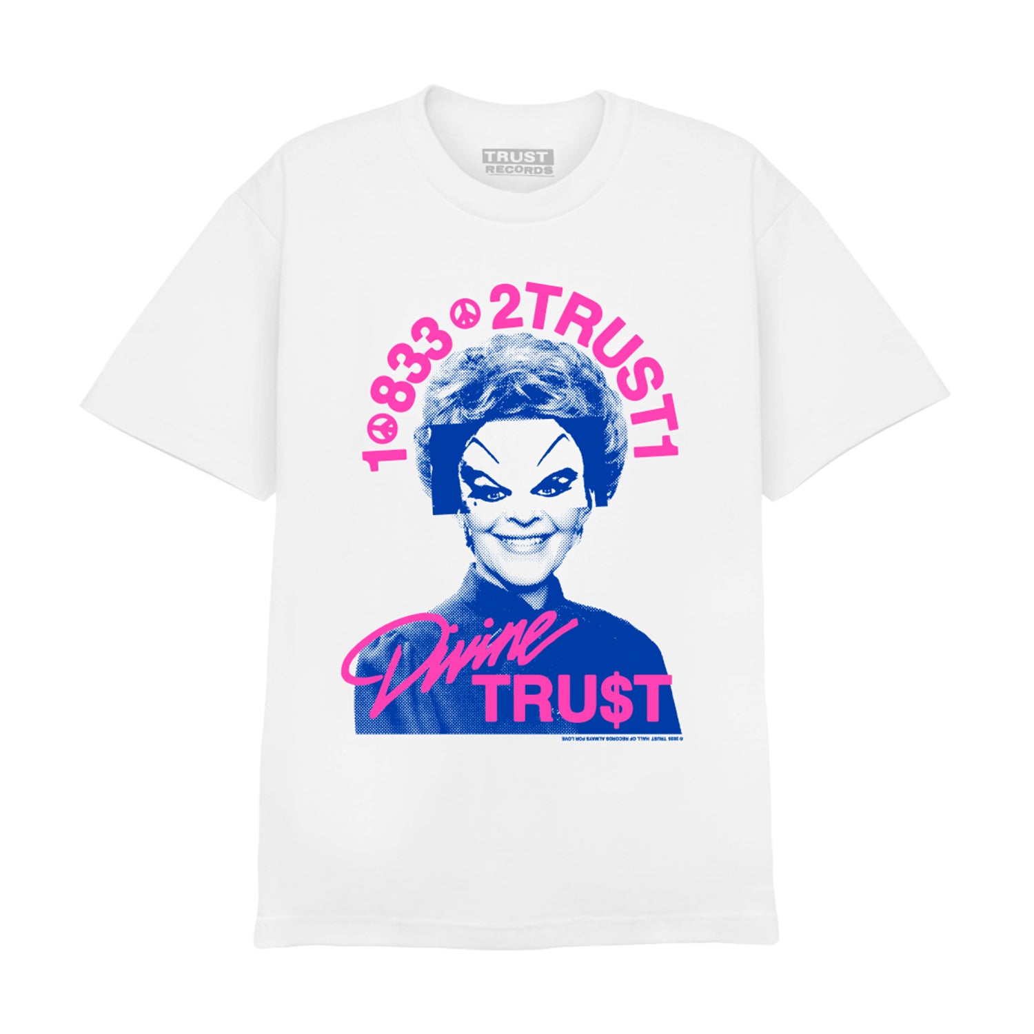 White T-shirt by Trust Records features a black-and-white photo of a smiling person in dramatic makeup, with bold pink and blue text—1-833-2TRUST1 and Divine Trust. Show off your unique style with this eye-catching tee.