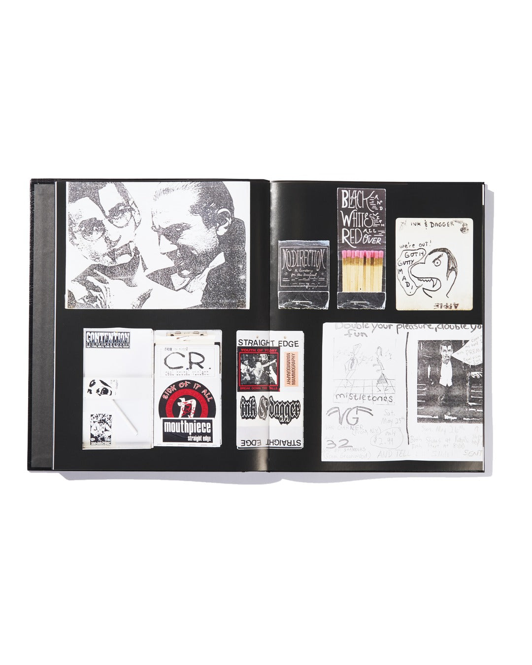 An open scrapbook displays black and white sketches, band flyers, a drink illustration, handwritten notes, and zine-style art arranged on two black pages—featuring limited edition music memorabilia inspired by Ink & Dagger and The Almighty Jeremy Dean Erik Bader.