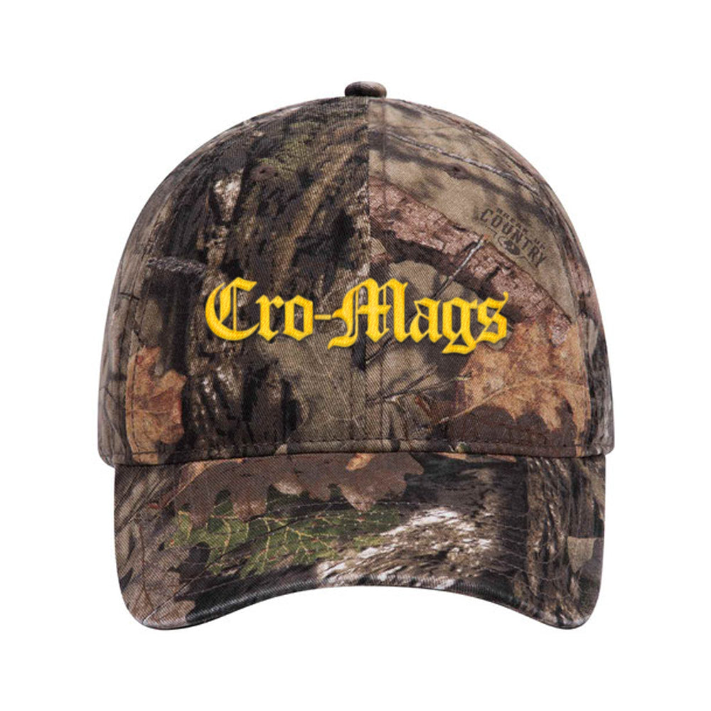 The CRO-MAGS Mossy Oak Camouflage Low Profile Dad Hat features yellow Gothic-style lettering on the front, blending bold style with classic OTTO CAP comfort.