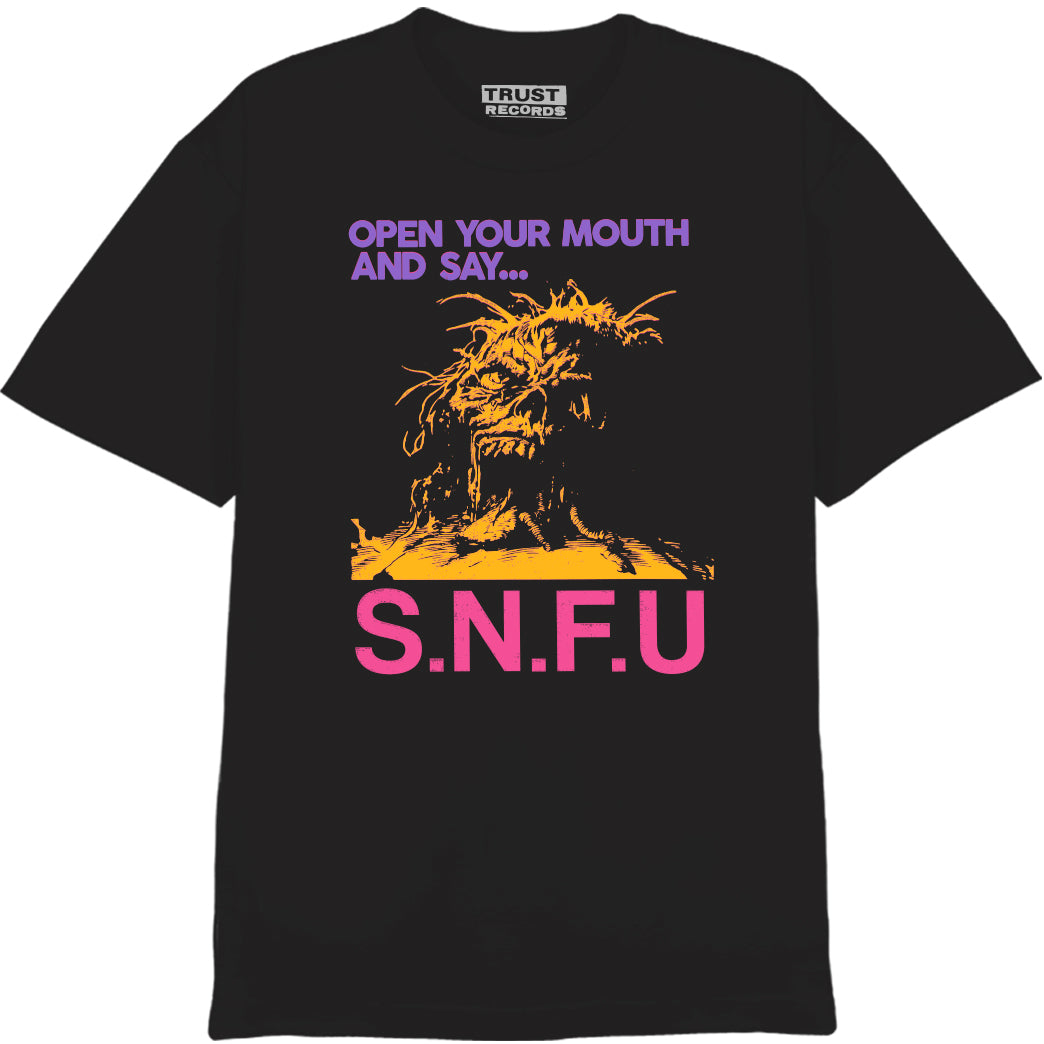 SNFU black t-shirt with a yellow snarling monster face graphic, purple "OPEN YOUR MOUTH AND SAY..." text, bold pink SNFU logo, printed on premium American Apparel 1301 with TRUST RECORDS tag.