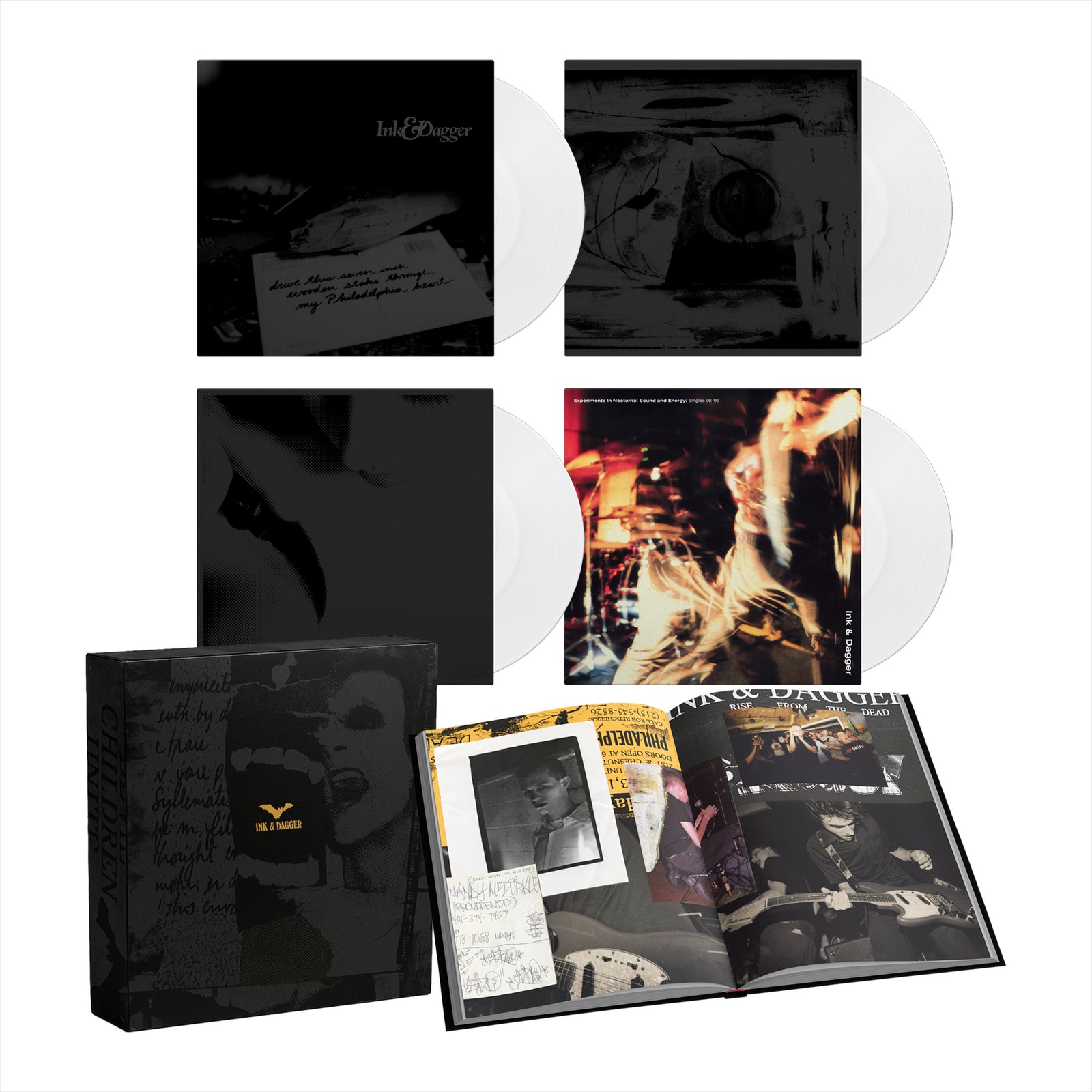 The Ink & Dagger deluxe vinyl box set includes their complete works on two white records in black sleeves, an open photo book with band images and notes, all packaged in a gothic black box featuring Ink & Dagger branding.