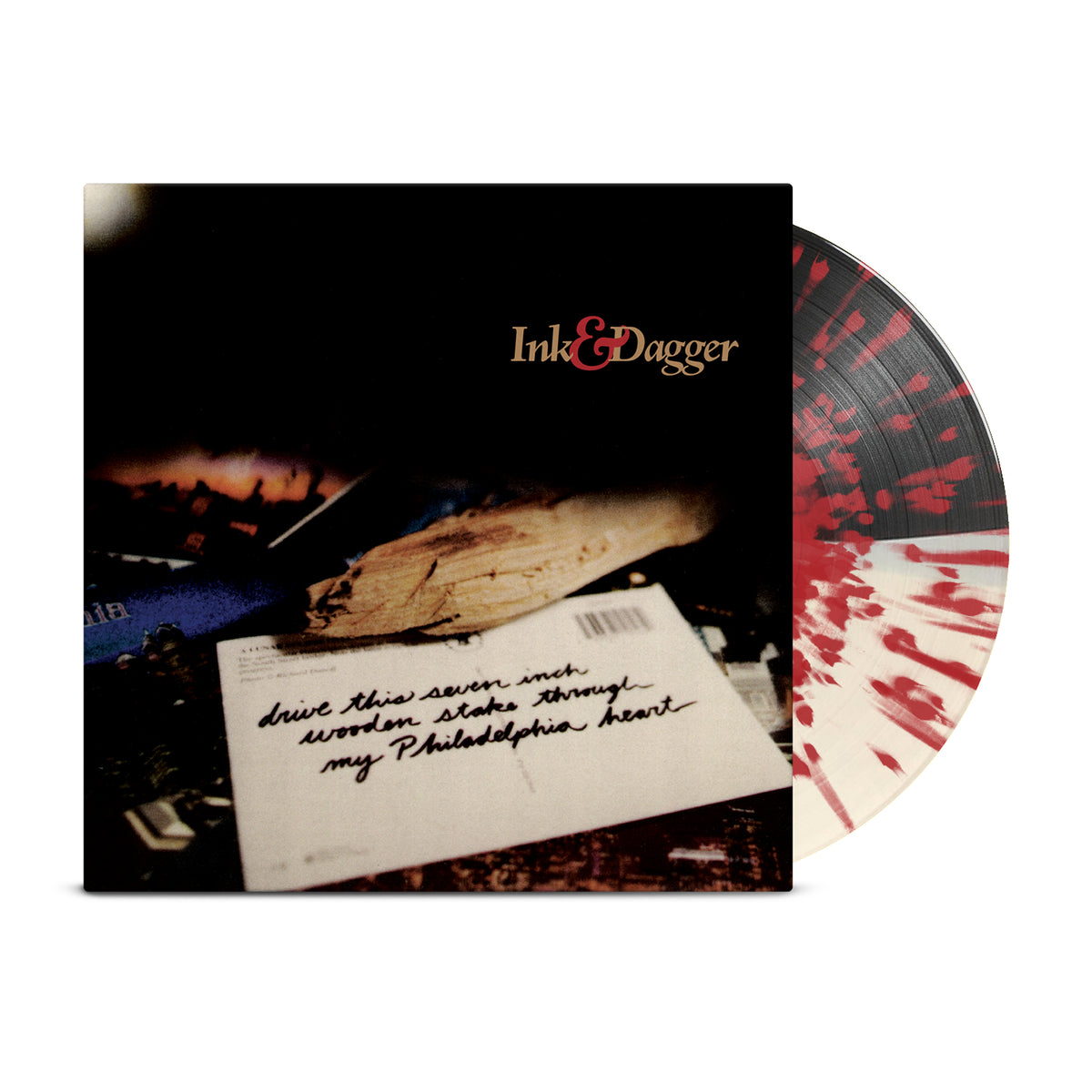 A red splatter Ink &amp; Dagger vinyl peeks behind an album cover with blurred images and a handwritten note: &quot;drive this seven inch wooden stake through my Philadelphia heart.