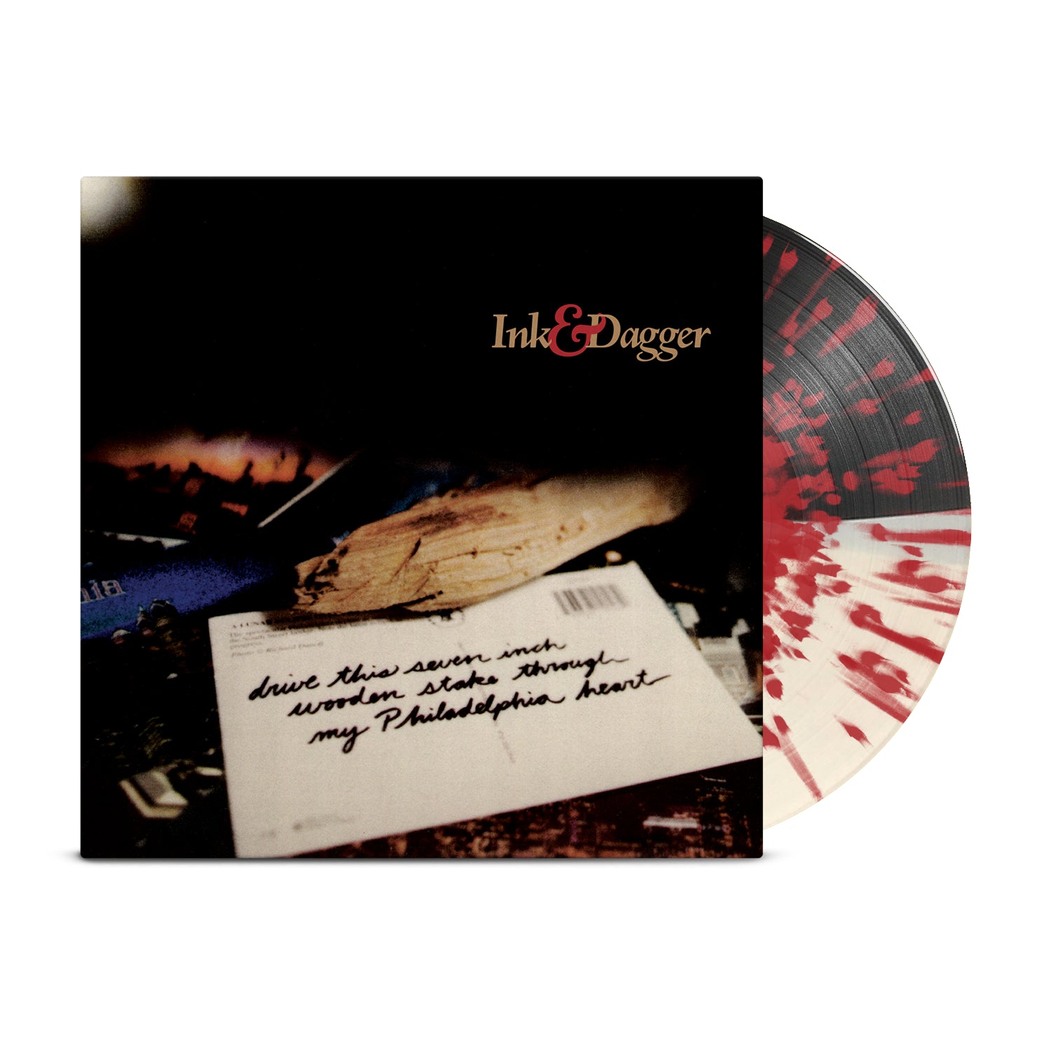 A red splatter Ink & Dagger vinyl peeks behind an album cover with blurred images and a handwritten note: "drive this seven inch wooden stake through my Philadelphia heart.