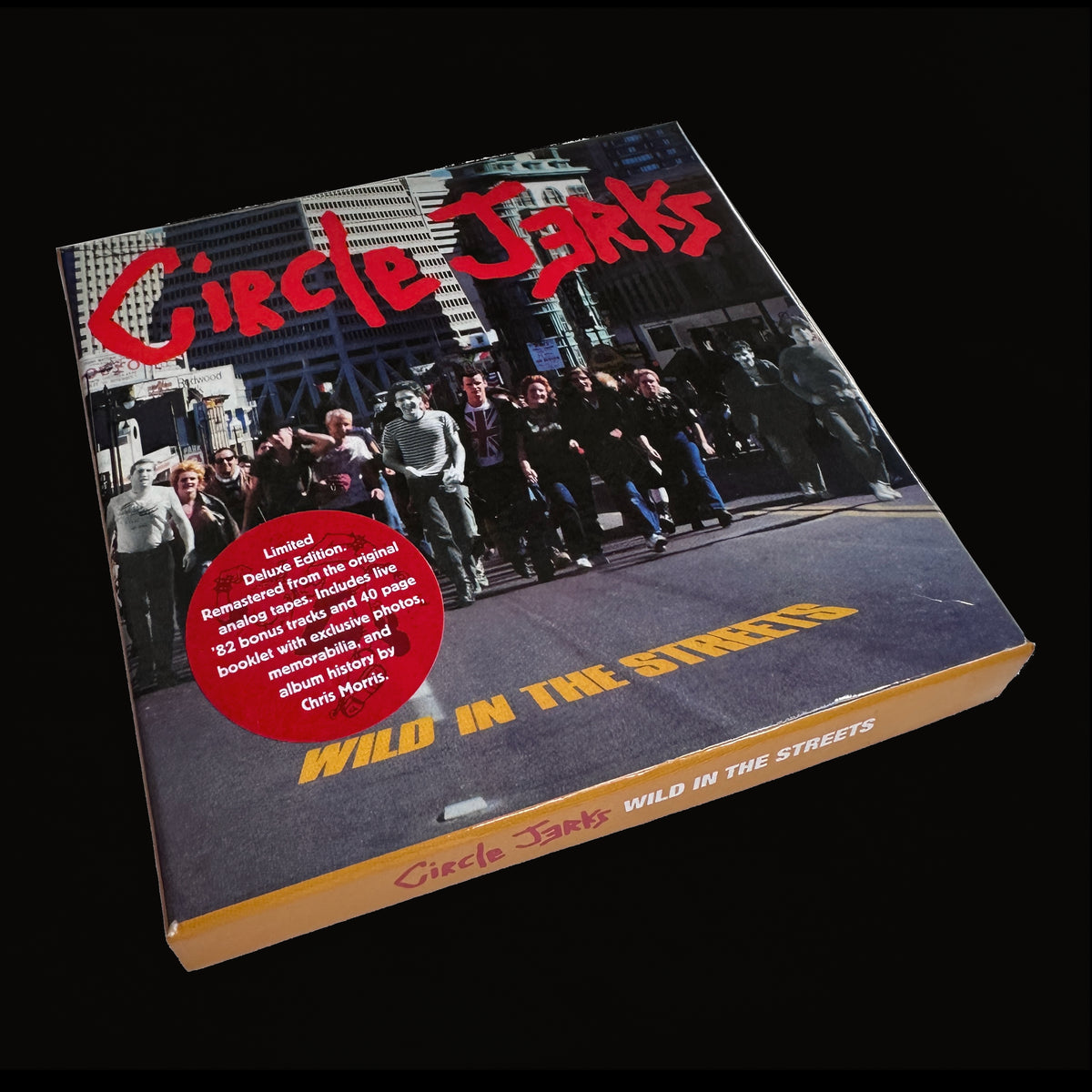 The Circle Jerks Wild In The Streets Deluxe Edition box set features a band photo cover, yellow album title, and a red sticker highlighting the Anniversary Edition CD plus other limited deluxe edition contents.