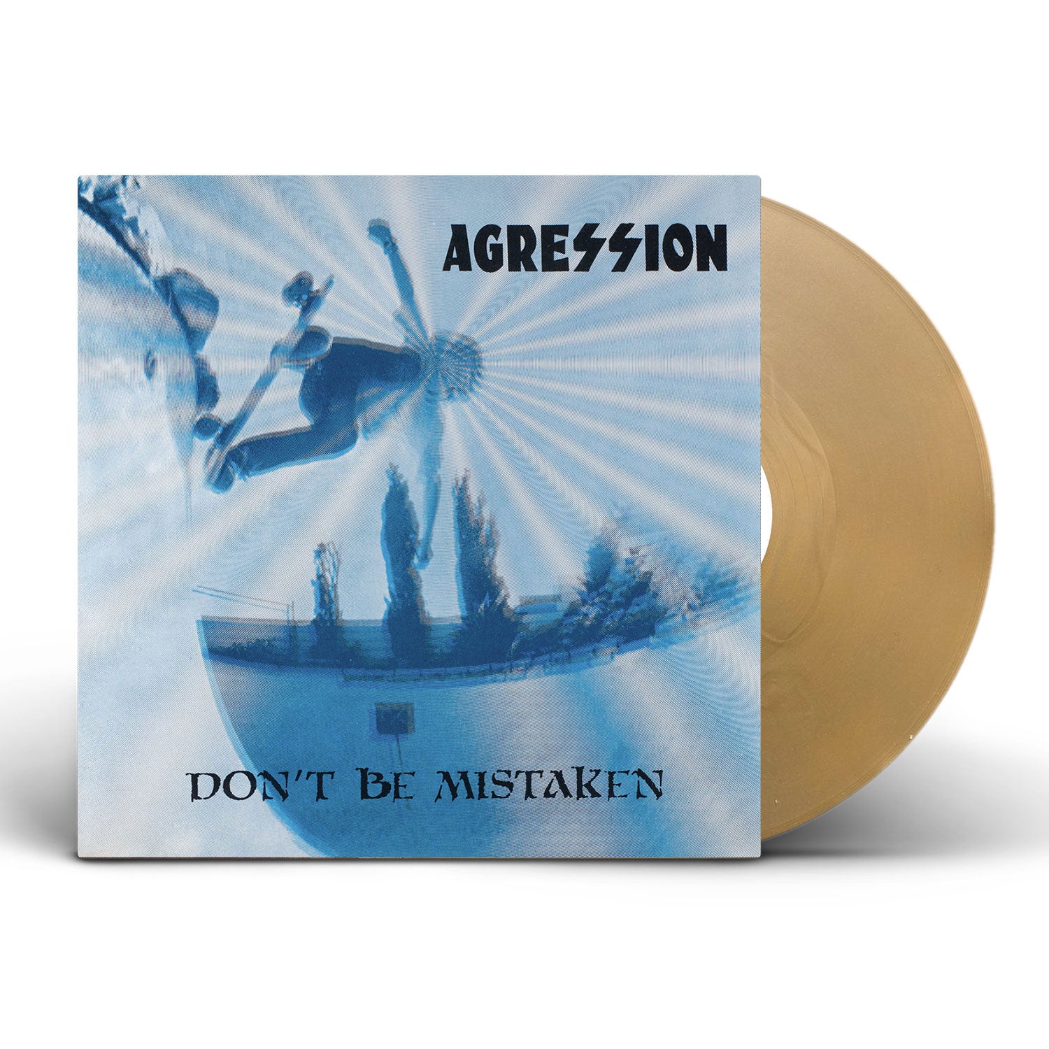 Agression Gold Variant vinyl record partially pulled from its sleeve, featuring skateboarders mid-air above a pool. The cover reads "Agression Don't Be Mistaken," showcasing this remastered edition.