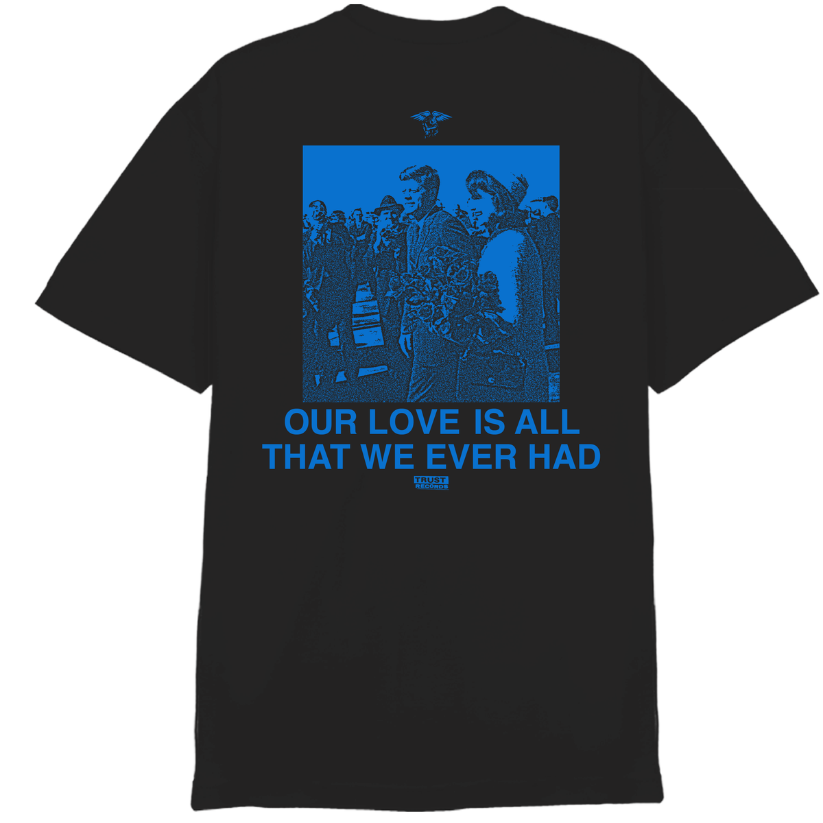 American Nightmare black Comfort Colors t-shirt with a blue-tinted image of people standing together. Large text says: “OUR LOVE IS ALL THAT WE EVER HAD,” with smaller text and logo below. Ships 7/10/26.