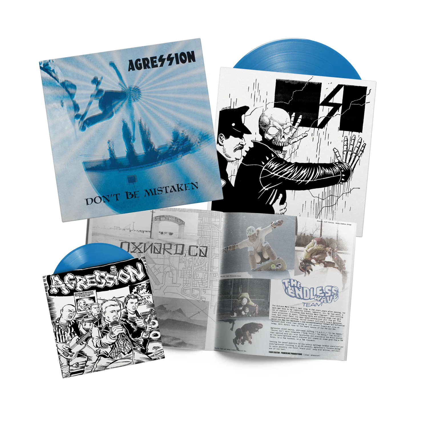 Agression: DONT BE MISTAKEN on a blue vinyl (Big Bob Blue Variant), includes a B&W illustrated booklet and a Limited Edition bonus mini vinyl with exclusive cover are shown.