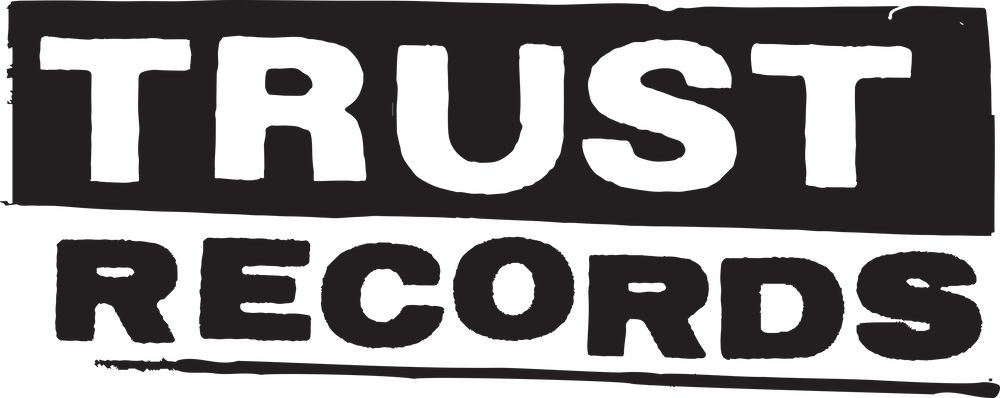 Black and white logo with the words TRUST RECORDS in bold, uppercase, distressed lettering, stacked with TRUST on top and RECORDS below, each in separate black rectangles.