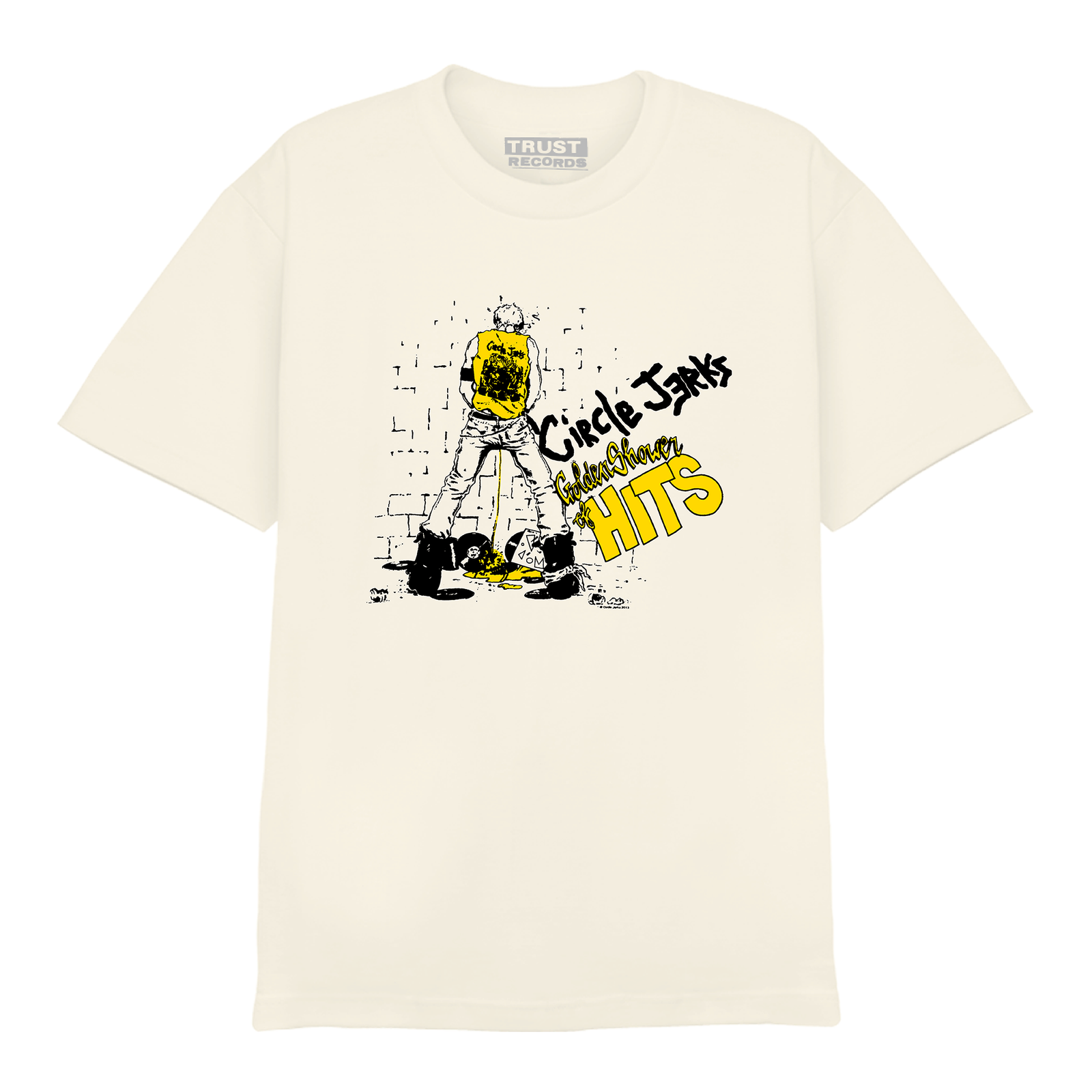 A beige Circle Jerks Comfort Colors T-shirt with cartoon art of a person urinating on a wall, bold graffiti-style "Circle Jerks" and "Golden Shower of Hits" text, capturing a true punk rock vibe.