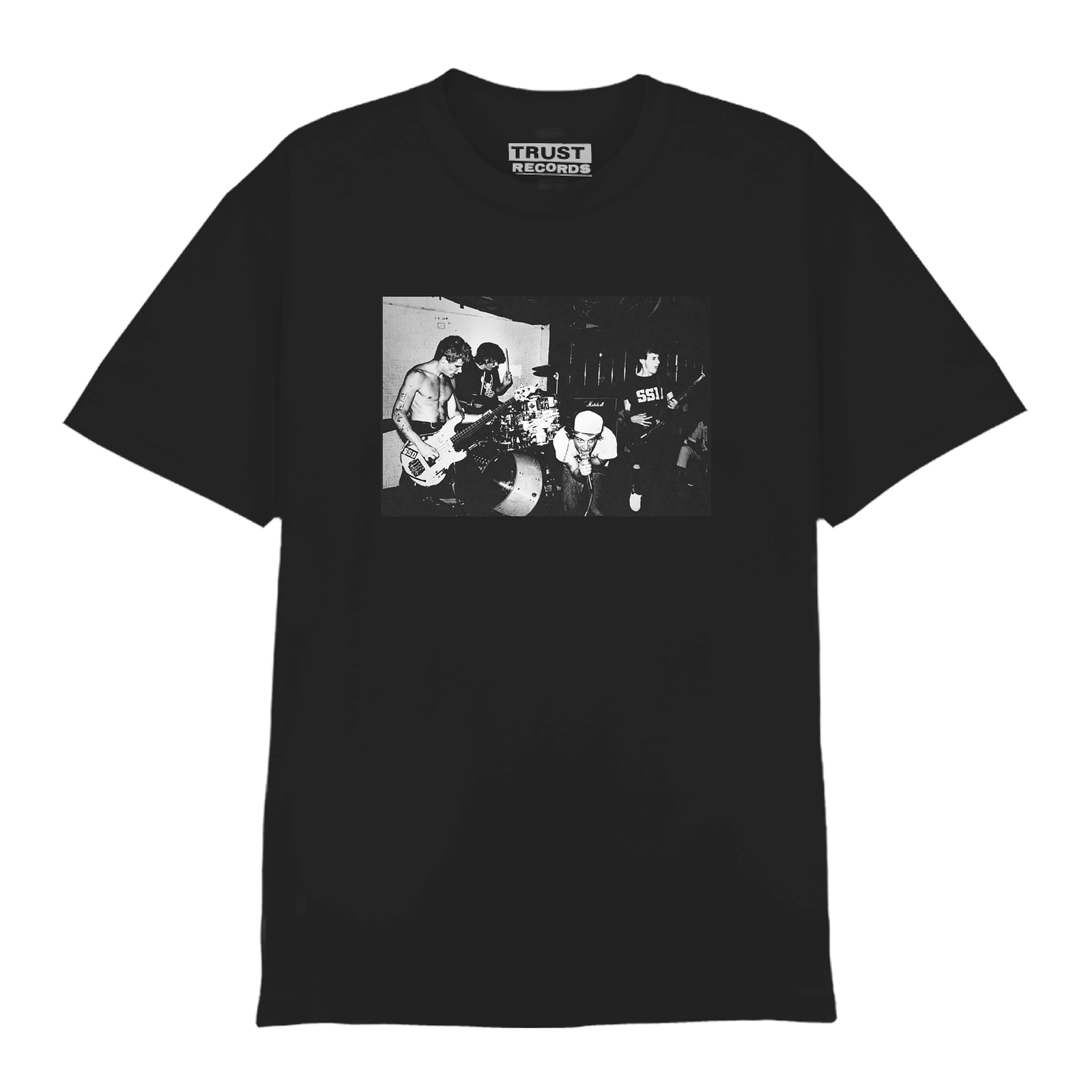 Circle Jerks t-shirt with a black-and-white photo of the 1984 lineup performing live indoors. Features band members on guitar, drums, and bass. Printed on soft Comfort Colors fabric for lasting comfort and style.