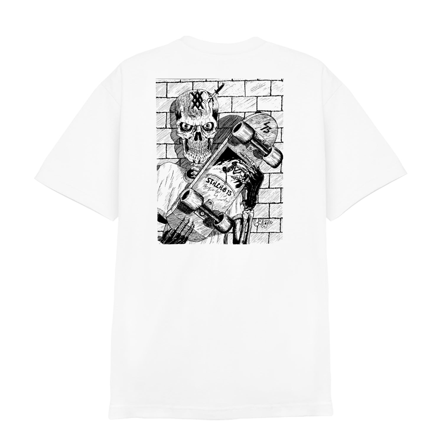 Stalag 13 white T-shirt with a black and white skeleton in a beanie, holding a skateboard and bottle, standing before a brick wall—a bold design from Stalag 13.