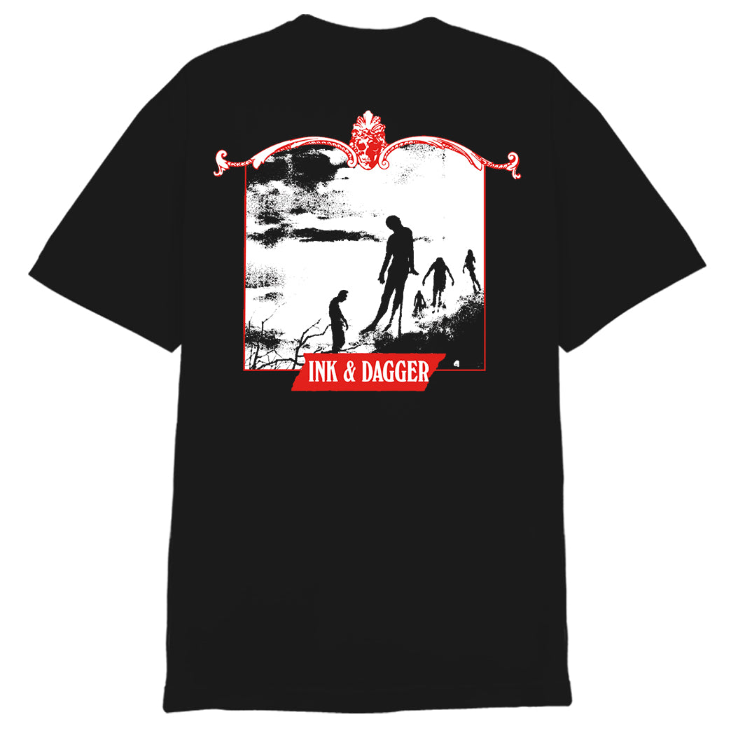 Ink & Dagger’s black T-shirt features bold red “DEVIL CHILDREN UNITE” text at the center on premium Comfort Colors fabric, with a “TRUST RECORDS” collar label. Ideal for fans of eye-catching prints.