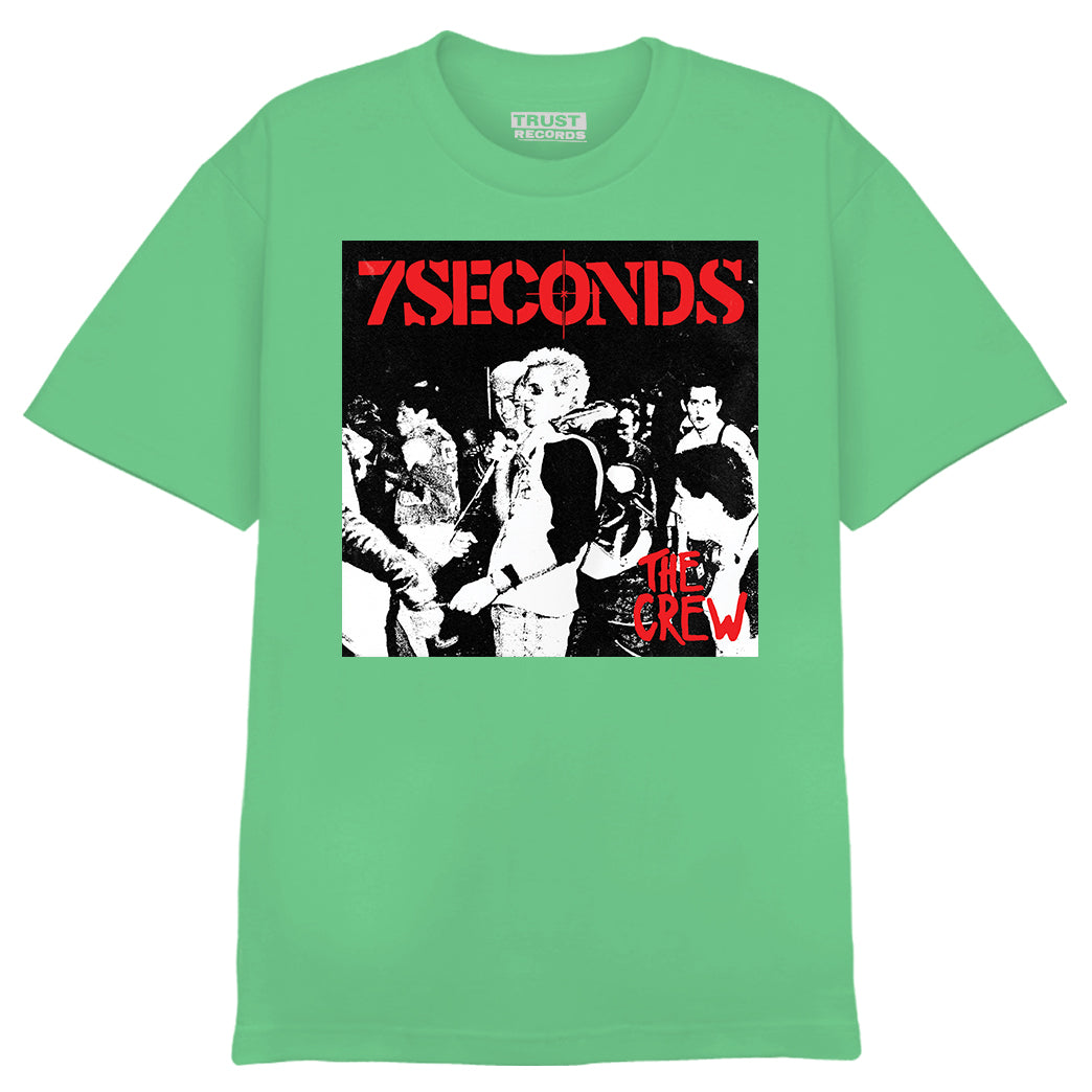 7 Seconds mint green 100% cotton Alstyle 1301 T-shirt featuring a silkscreened black-and-white “7Seconds” punk band album cover with bold red “7SECONDS” and “THE CREW” text.