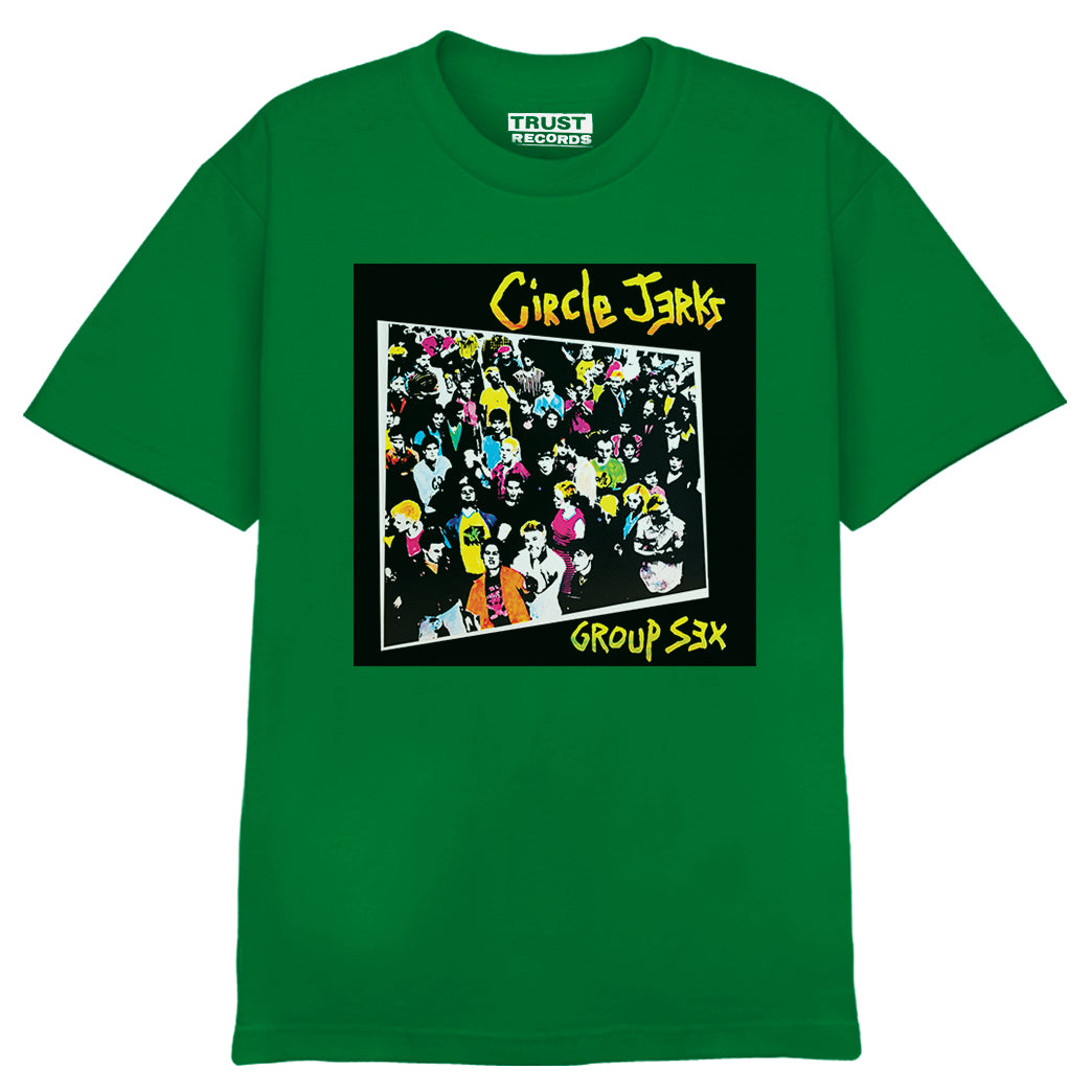 Circle Jerks green Alstyle 1301 T-shirt with Group Sex album cover—vivid silkscreen print of cartoon faces packed together, plus band name and album title in bold yellow lettering.