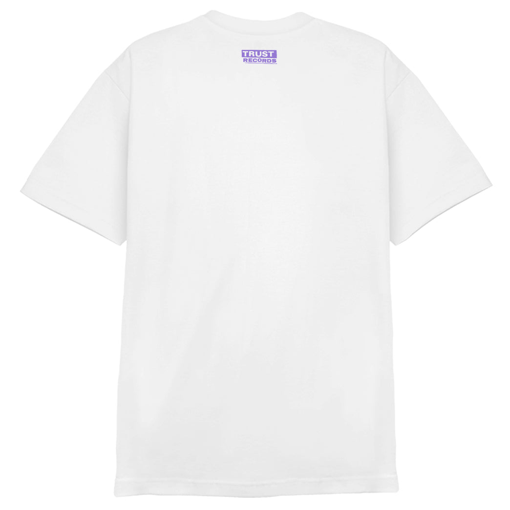 A plain white 7 Seconds 1301 short-sleeve T-shirt seen from the back, featuring a small purple TRUST RECORDS logo silkscreened just below the neckline.